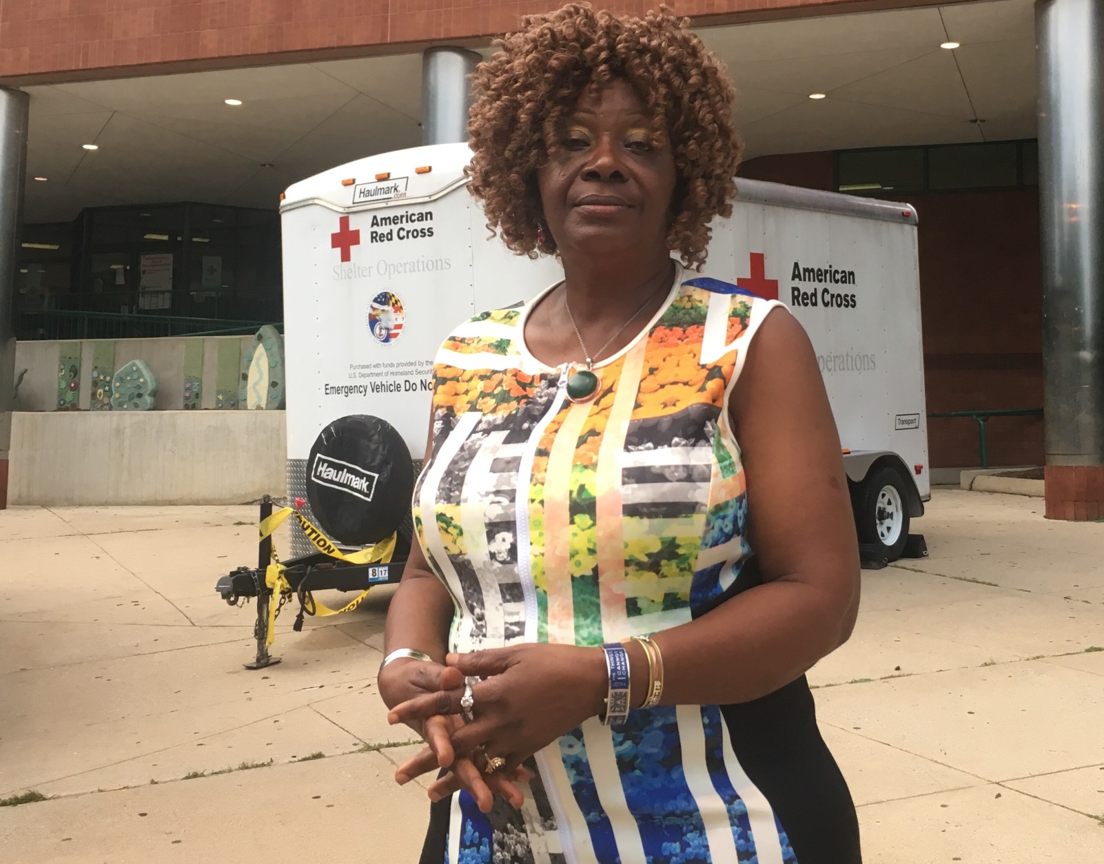 Mariama Turay stands outside Long Branch Community Center Shelter, where she has been staying since the explosion. (WTOP/Mike Murillo)