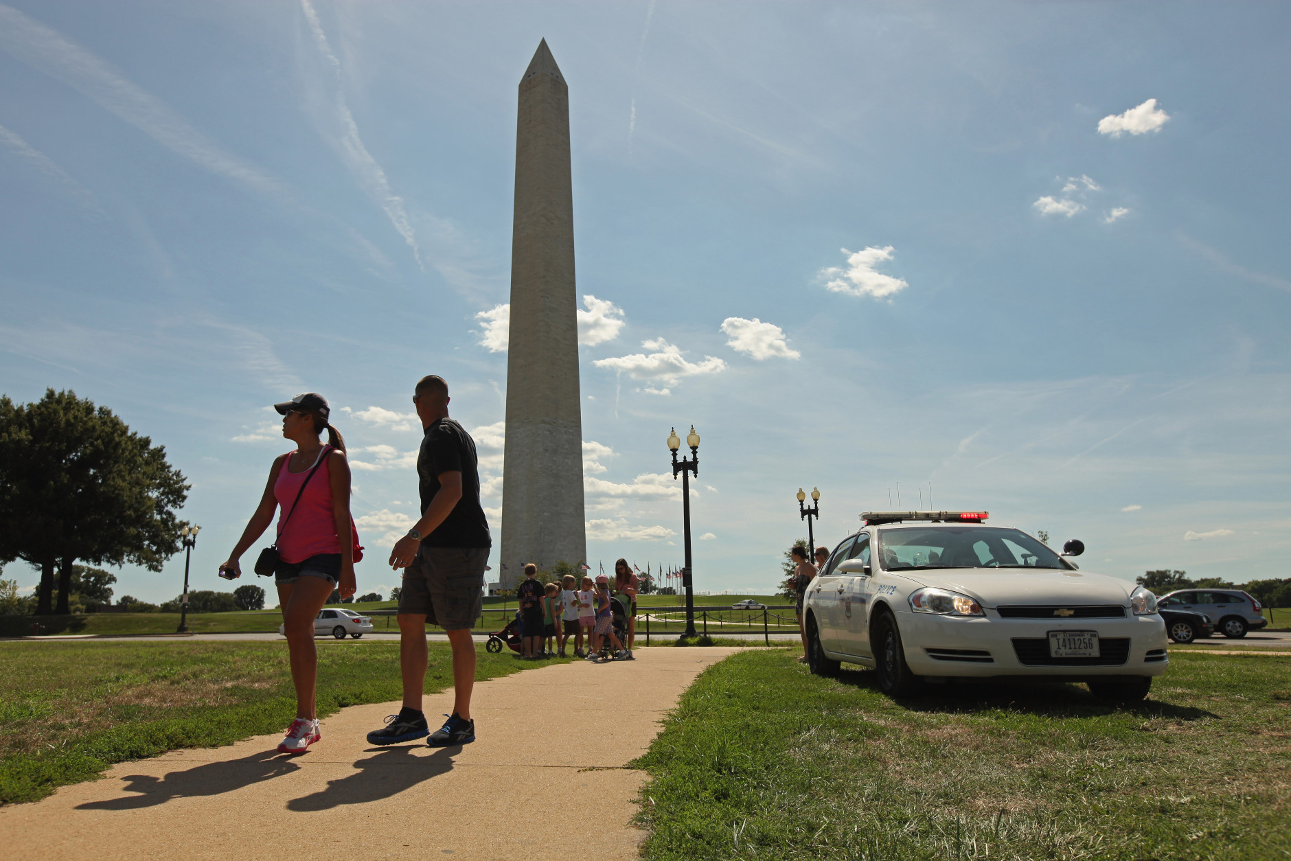 WASHINGTON, DC - AUGUST 23:  U.S. Park Police work to keep people away from the area surrounding the Washington Monument after a 5.8 magnitude earthquake struck the east coast August 23, 2011 in Washington, DC. Police officers said that unidentified material had fallen off the Washington Monument as a result of the earthquake. All the monuments and buildings along the National Mall have been evacuated and closed.  (Photo by Chip Somodevilla/Getty Images)