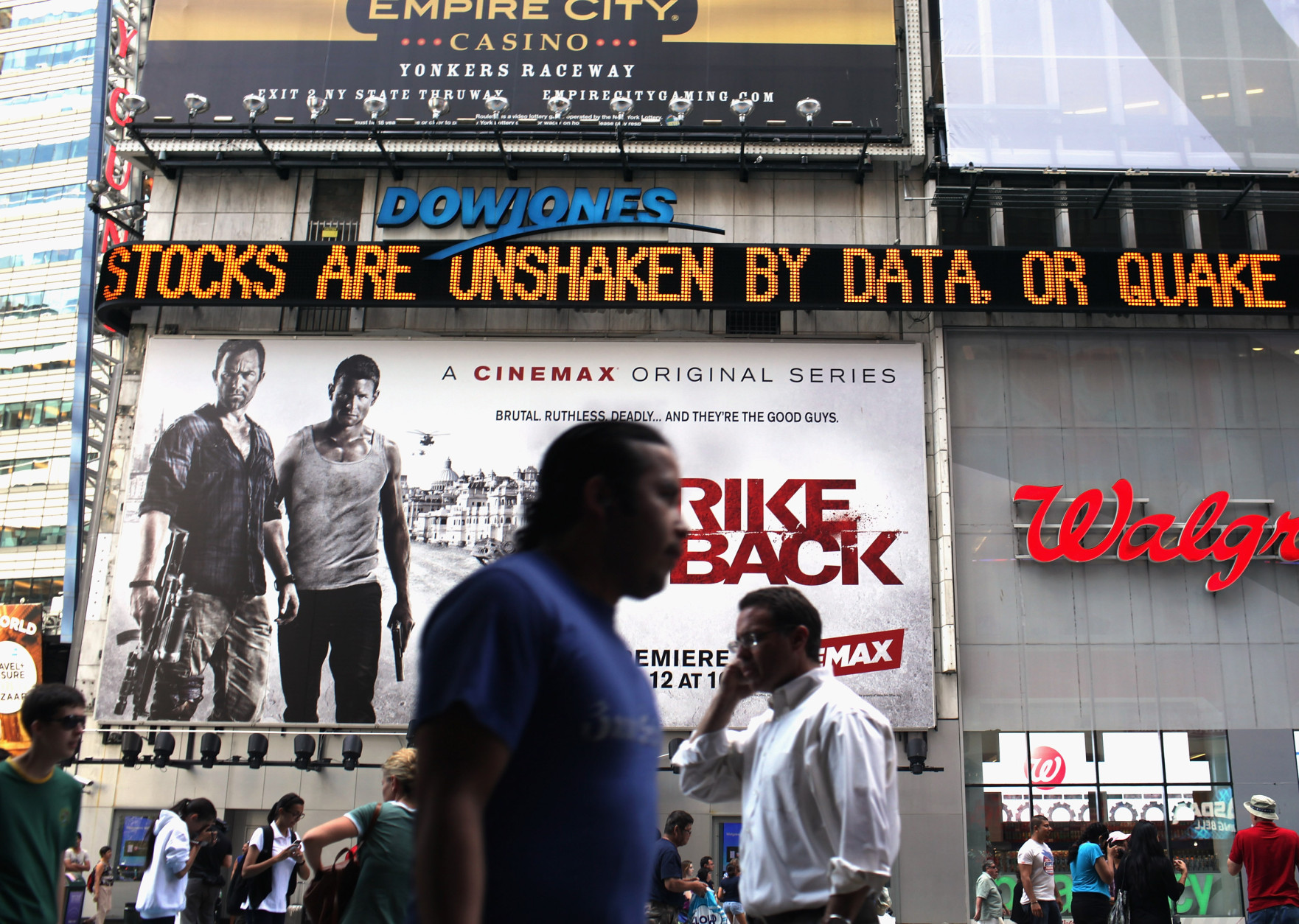 NEW YORK, NY - AUGUST 23: A news ticker in Times Square comments on an earlier earthquake on August 23, 2011 in New York City.  The epicenter of the 5.8 earthquake was located near Louisa in central Virginia. Two nuclear power plants at the North Anna Power Station in the same county were reportedly taken offline.  (Photo by Spencer Platt/Getty Images)