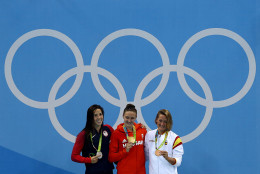 (L-R) Silver medalist Maya Dirado of the United States of America, gold medal medalist Katinka Hosszu and bronze medalist Mireia Belmonte Garcia of Spain pose during the medal ceremony for the Final of the Women's 400m Individual Medley on Day 1 of the Rio 2016 Olympic Games at the Olympic Aquatics Stadium on August 6, 2016 in Rio de Janeiro, Brazil. (Photo by Lars Baron/Getty Images)