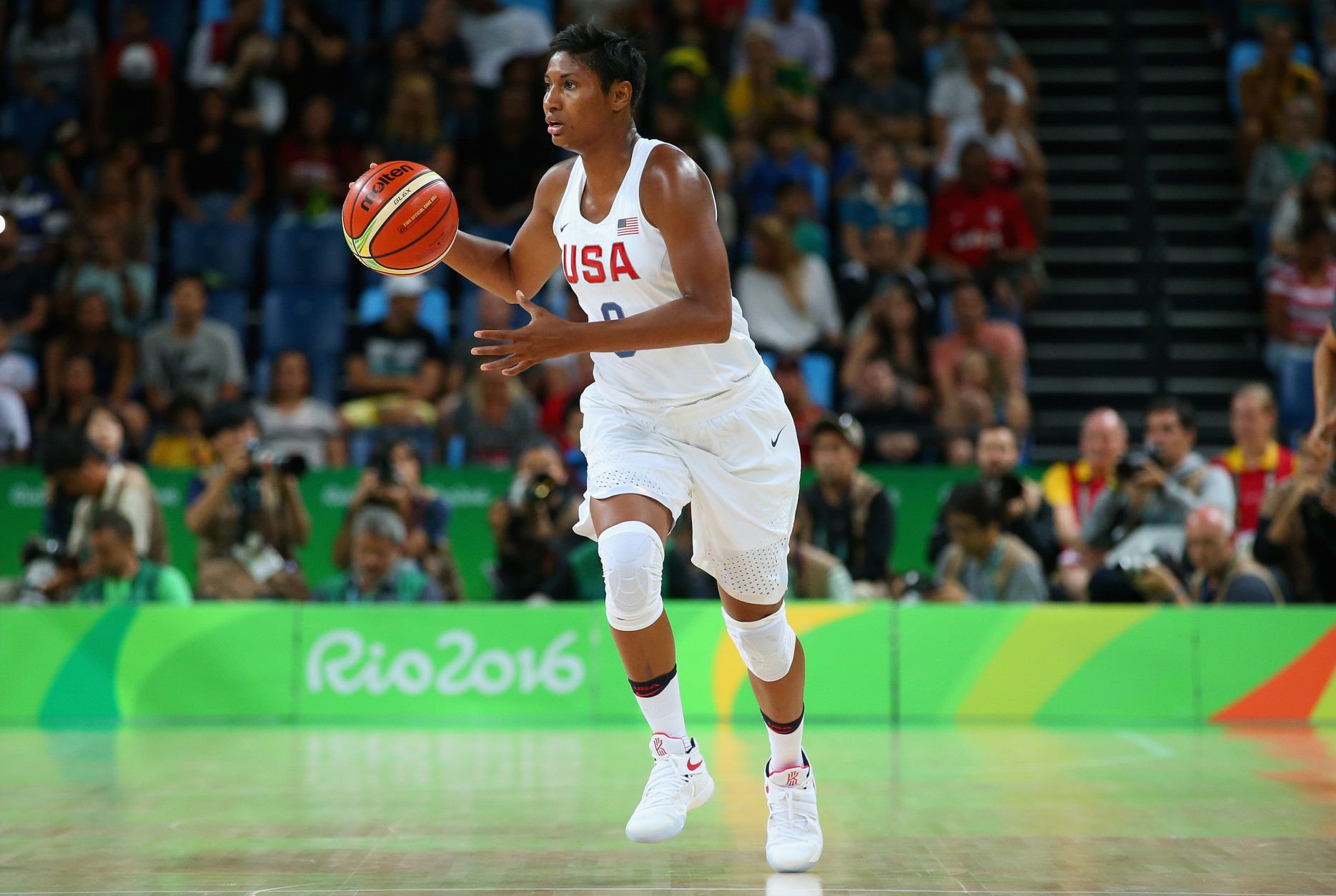 RIO DE JANEIRO, BRAZIL - AUGUST 16:  Angel Mccoughtry #8 of United States controls the ball during the Women's Quarterfinal match against Japan on Day 11 of the Rio 2016 Olympic Games at Carioca Arena 1 on August 16, 2016 in Rio de Janeiro, Brazil.  (Photo by Alex Livesey/Getty Images)