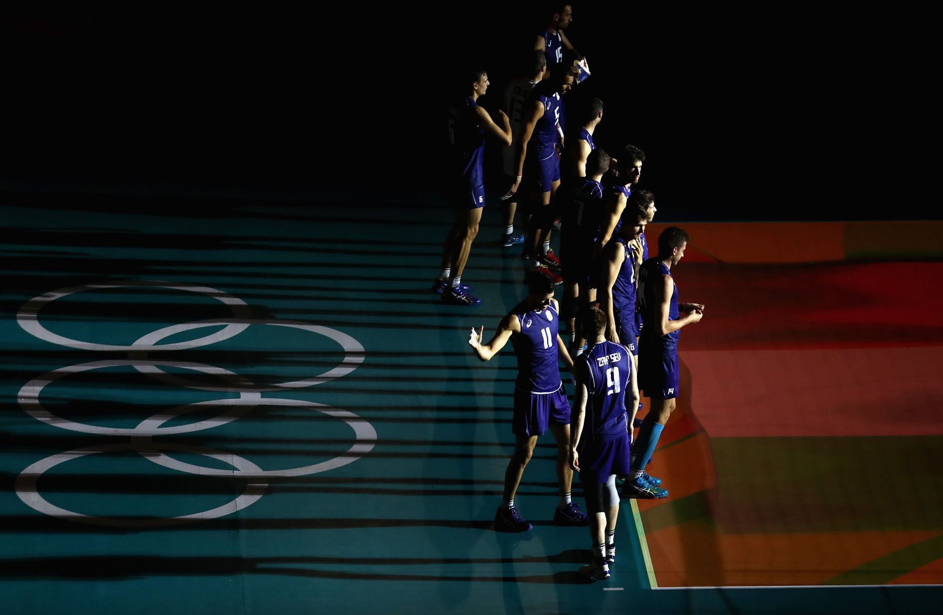 RIO DE JANEIRO, BRAZIL - AUGUST 17:  Team Italy enters the court prior to Team Iran during the Men's Quarterfinal Volleyball match on Day 12 of the Rio 2016 Olympic Games at Maracanazinho on August 17, 2016 in Rio de Janeiro, Brazil.  (Photo by Sean M. Haffey/Getty Images)