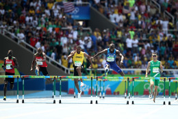 RIO DE JANEIRO, BRAZIL - AUGUST 18:  Kerron Clement of the United States leads Boniface Mucheru Tumuti of Kenya, Annsert Whyte of Jamaica and Thomas Barr of Ireland during the Men's 400m Hurdles Final on Day 13 of the Rio 2016 Olympic Games at the Olympic Stadium on August 18, 2016 in Rio de Janeiro, Brazil.  (Photo by Cameron Spencer/Getty Images)