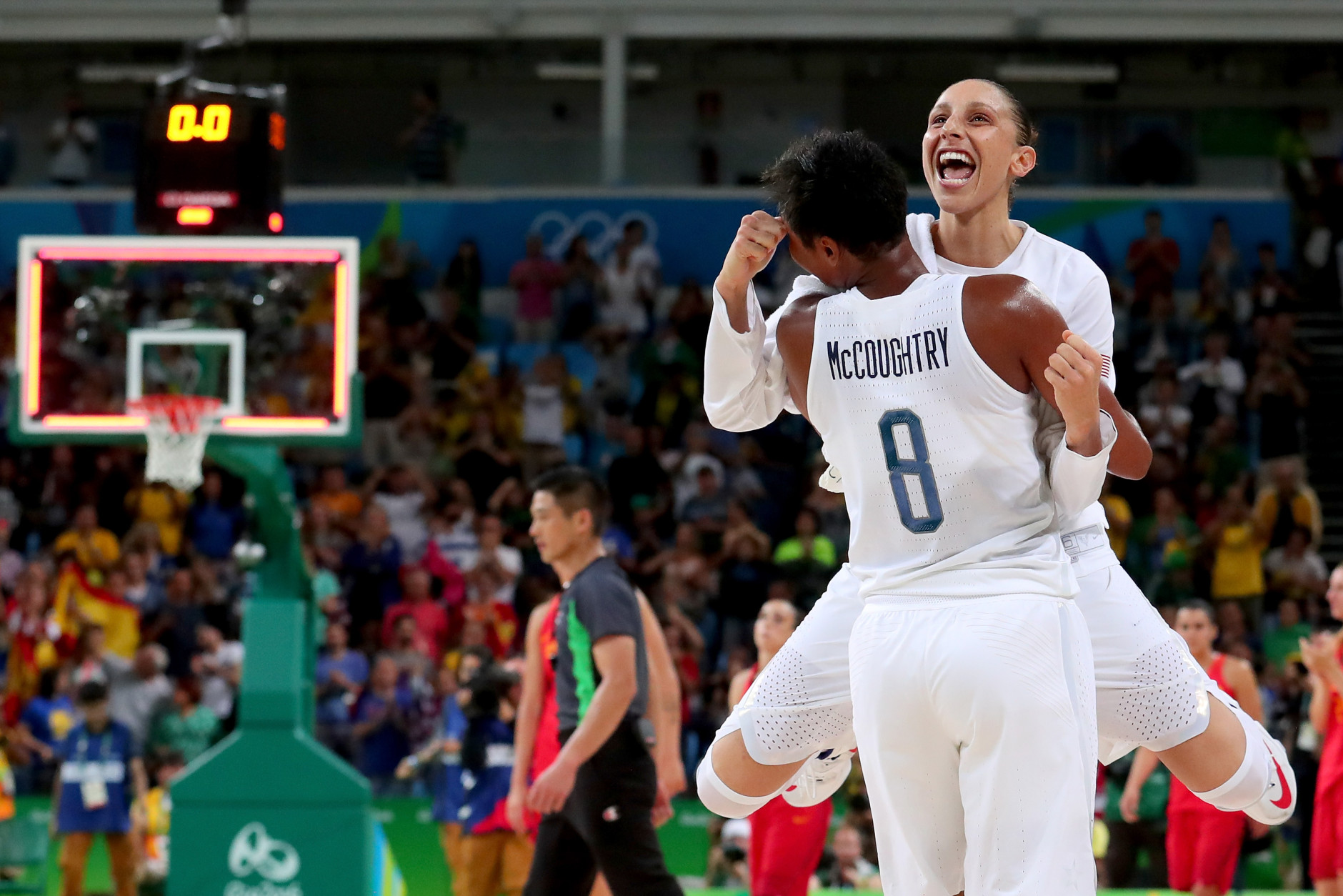 RIO DE JANEIRO, BRAZIL - AUGUST 20:  Angel Mccoughtry #8 and Diana Taurasi #12 of United States celebrate after winning the Women's Gold Medal Game between United States and Spain on Day 15 of the Rio 2016 Olympic Games at Carioca Arena 1 on August 20, 2016 in Rio de Janeiro, Brazil.  (Photo by Tom Pennington/Getty Images)