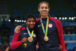 RIO DE JANEIRO, BRAZIL - AUGUST 20:  (L-R) Gold medalists Angel Mccoughtry #8 and Brittney Griner #15 of United States celebrate during the medal ceremony after the Women's Basketball competition on Day 15 of the Rio 2016 Olympic Games at Carioca Arena 1 on August 20, 2016 in Rio de Janeiro, Brazil.  (Photo by Tom Pennington/Getty Images)