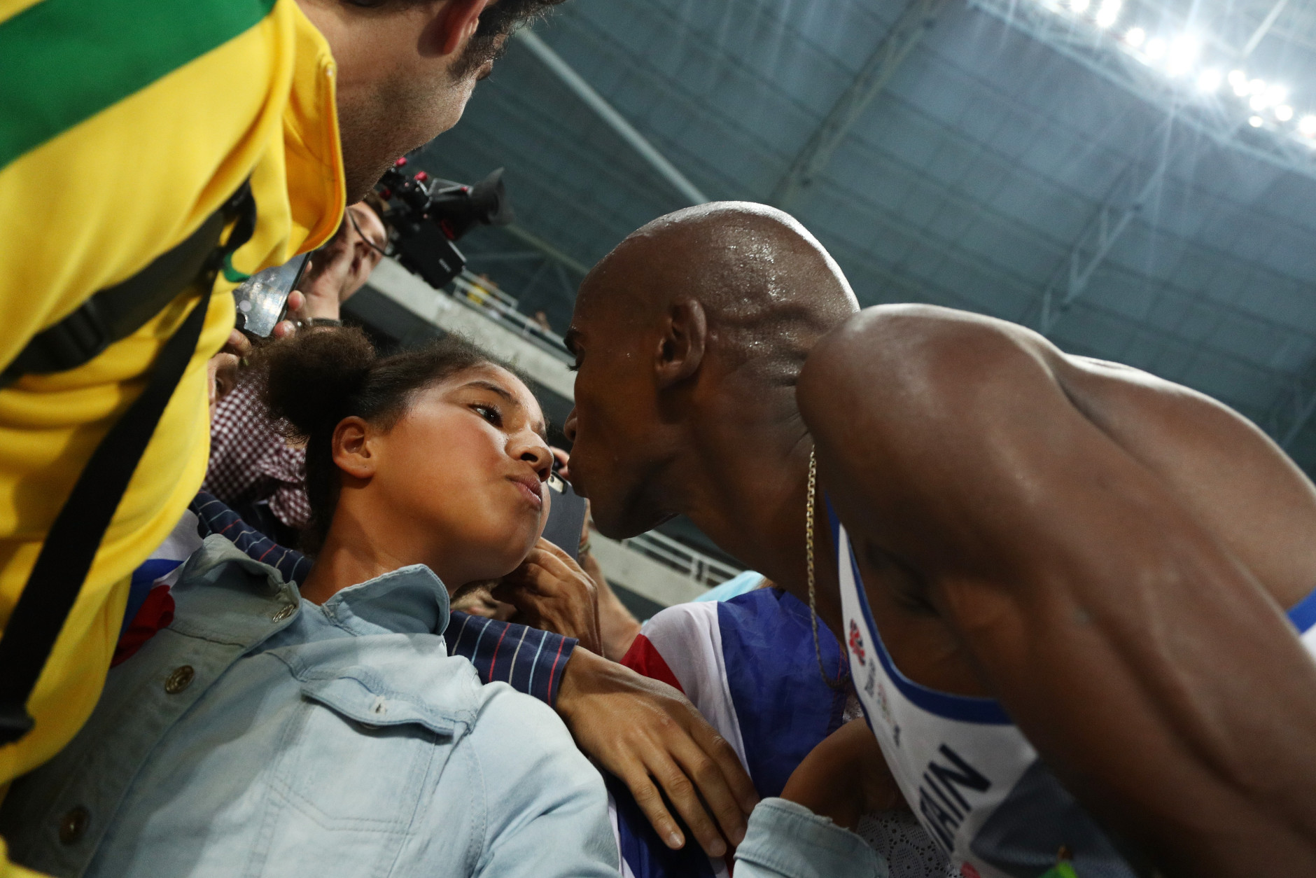 RIO DE JANEIRO, BRAZIL - AUGUST 20:  Mohamed Farah of Great Britain celebrates with daughter Rihanna after winning gold in the Men's 5000 meter Final on Day 15 of the Rio 2016 Olympic Games at the Olympic Stadium on August 20, 2016 in Rio de Janeiro, Brazil.  (Photo by Patrick Smith/Getty Images)