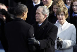 WASHINGTON - JANUARY 20:  President Barack is congratulated by former president George W. Bush during his inauguration  as the 44th President of the United States of America on the West Front of the Capitol January 20, 2009 in Washington, DC. Obama becomes the first African-American to be elected to the office of President in the history of the United States.  (Photo by Alex Wong/Getty Images)