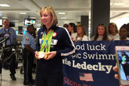 Katie Ledecky arrives at Dulles International Airport after winning four gold medals at the Rio Olympics. (WTOP/Kristi King)