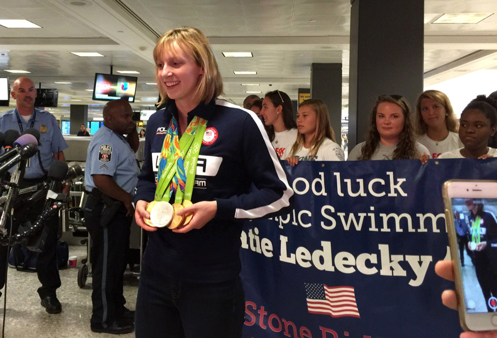 Katie Ledecky arrives at Dulles International Airport after winning four gold medals at the Rio Olympics. (WTOP/Kristi King)