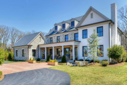 This photo provided by MRIS shows 956 Mackall Farms Lane in McLEan, Virginia. The traditional style home sold for $4 million in July. (MRIS)