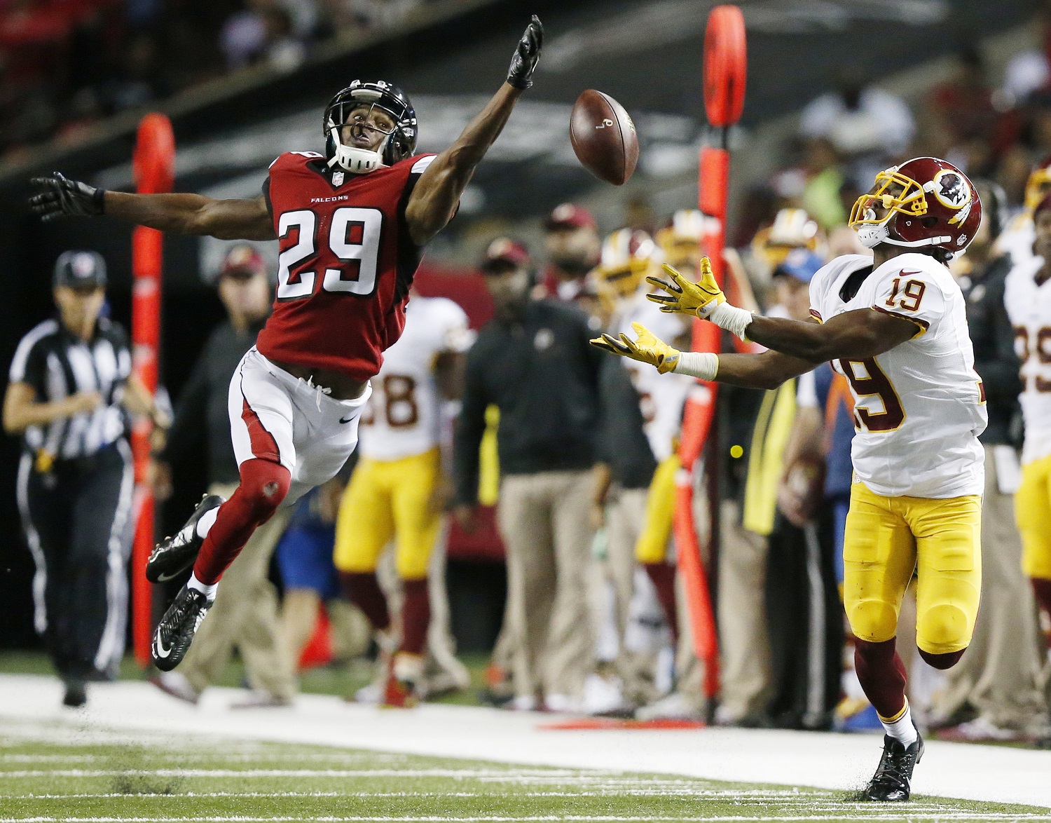 Atlanta Falcons cornerback C.J. Goodwin (29) breaks up a pass intended for Washington Redskins wide receiver Rashad Ross (19) during the first half of a preseason NFL football game, Thursday, Aug. 11, 2016, in Atlanta. (AP Photo/Brynn Anderson)