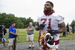Washington Redskins offensive tackle Trent Williams (71) jogs to the field during the NFL football team's minicamp at the Redskins Park in Ashburn, Va., Wednesday, June 15, 2016. (AP Photo/Manuel Balce Ceneta)