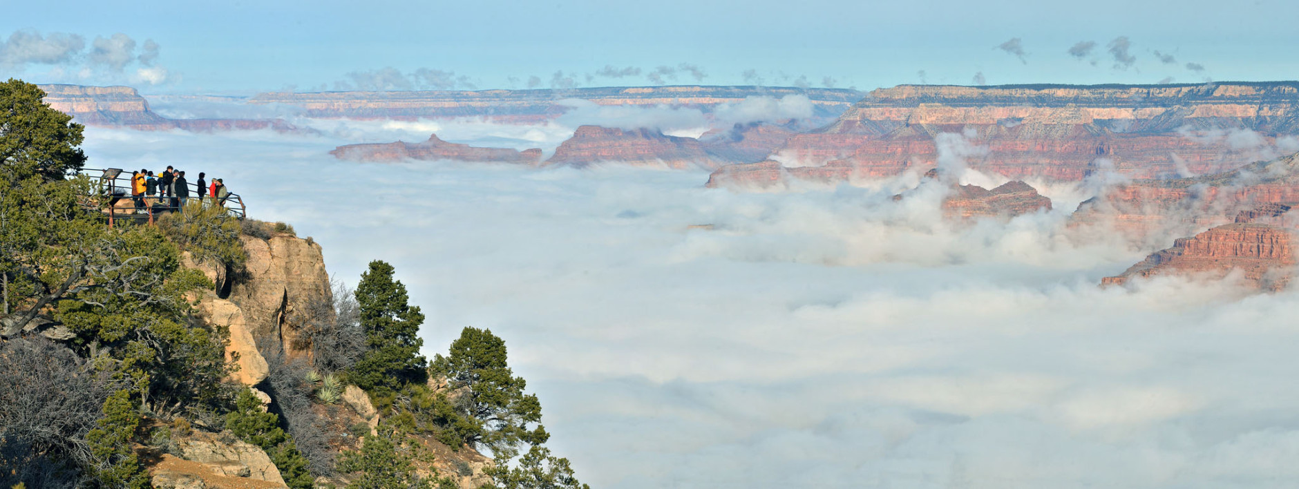 Visitors viewing the inversion from Hopi Point along Hermit Road on the South Rim of Grand Canyon National Park in Arizona. (Courtesy flickr/M. Quinn, National Parks Service)