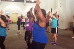 Participants sweat it out during a two-hour Zumbathon fundraiser in Takoma Park, Md. on Sunday, Aug. 28, 2016. (WTOP/Kathy Stewart)