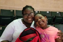 Anjee, at left, and Anaya Randolph pose for a photo during the sixth annual Prince George's County Back to School Fair. The event was held at the Show Place Arena on Saturday, Aug. 6, 2016. (WTOP/Allison Keyes)
