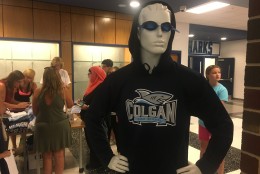 Students purchased sweaters and T-shirts featuring the schools logo and mascot, the shark. (Courtesy Colgan High School)