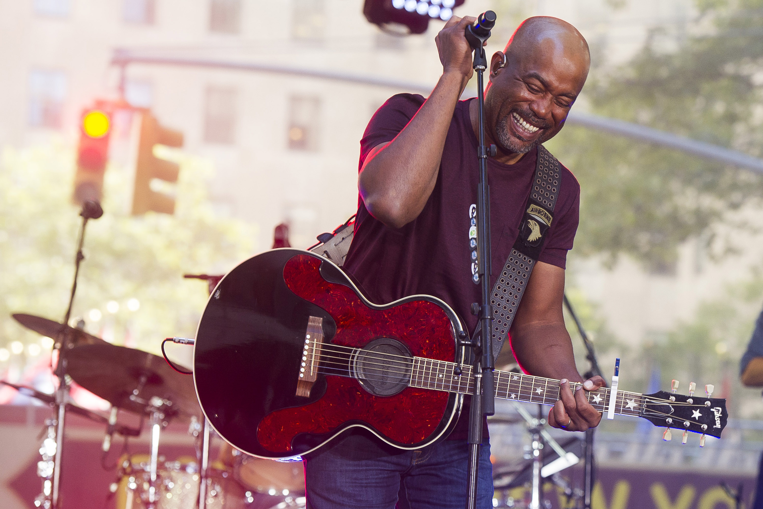 An image of Darius Rucker singing the National Anthem is projected