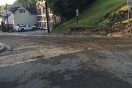 Mud covers the roads in Ellicott City, Maryland, after a flash flood destroyed Main Street. (WTOP/Dennis Foley)