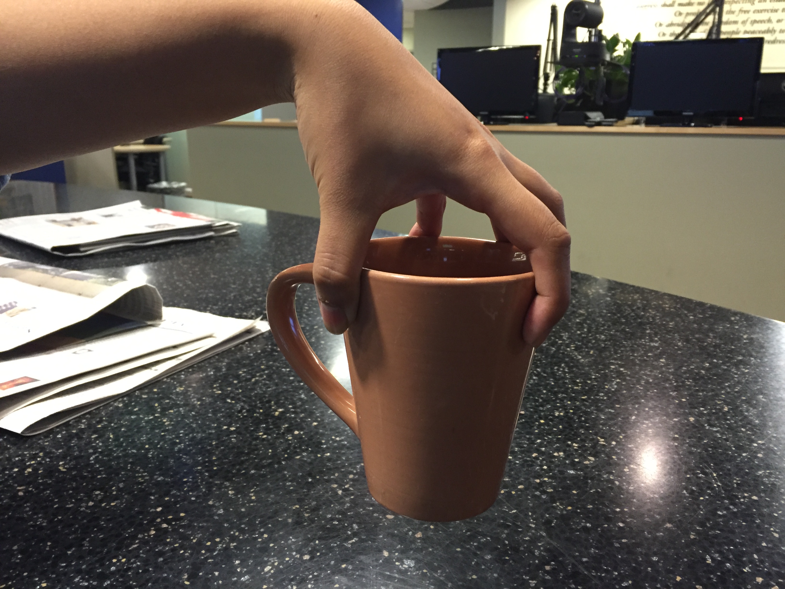 Non-spill Cup Hands Image & Photo (Free Trial)