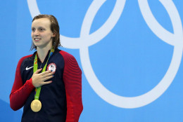 United States' Katie Ledecky listens to the national anthem after winning gold in the women's 200-meter freestyle during the swimming competitions at the 2016 Summer Olympics, Tuesday, Aug. 9, 2016, in Rio de Janeiro, Brazil. (AP Photo/Lee Jin-man)