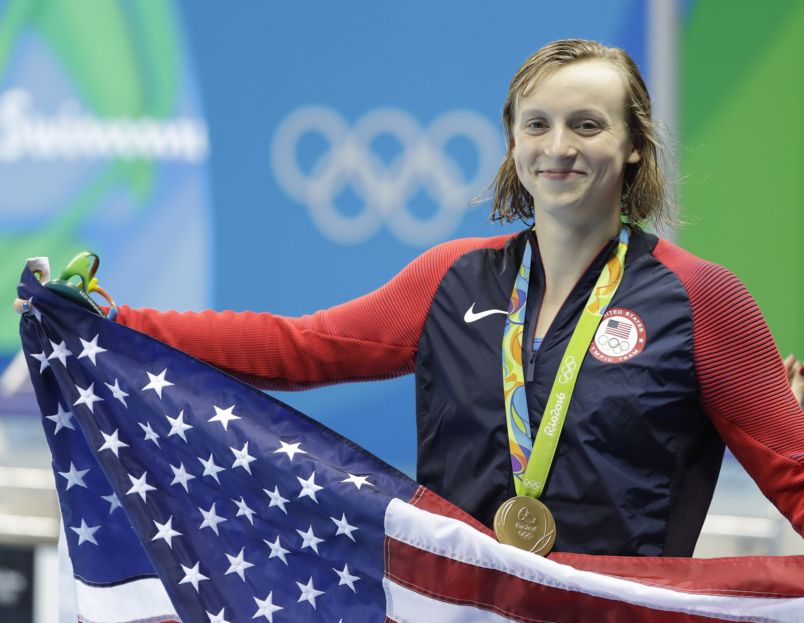 Winner United States' Katie Ledecky, celebrates with her medal after the women's 400-meter freestyle during the swimming competitions at the 2016 Summer Olympics, Monday, Aug. 8, 2016, in Rio de Janeiro, Brazil. (AP Photo/Matt Slocum)