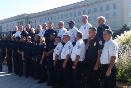 Firefighters and volunteers who responded to the 9/11 Pentagon attack gathered for a 15-year anniversary photo Saturday, August 27, 2016. (WTOP/Kathy Stewart)