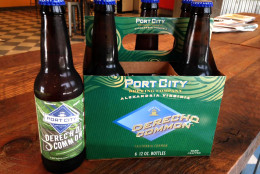 In this file photo, a six pack of Port City Brewing's limited release beer Derecho sits on the bar at the Alexandria brewery. The business will expand into new markets and will more than double its production to meet the growing demand with the help of state and local grants. (WTOP File Photo/Michelle Basch)