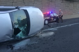 The trooper rescued the driver of the vehicle that hit the police cruiser Saturday on northbound I-270  by breaking the windshield. (Courtesy Montgomery County Fire and Rescue)