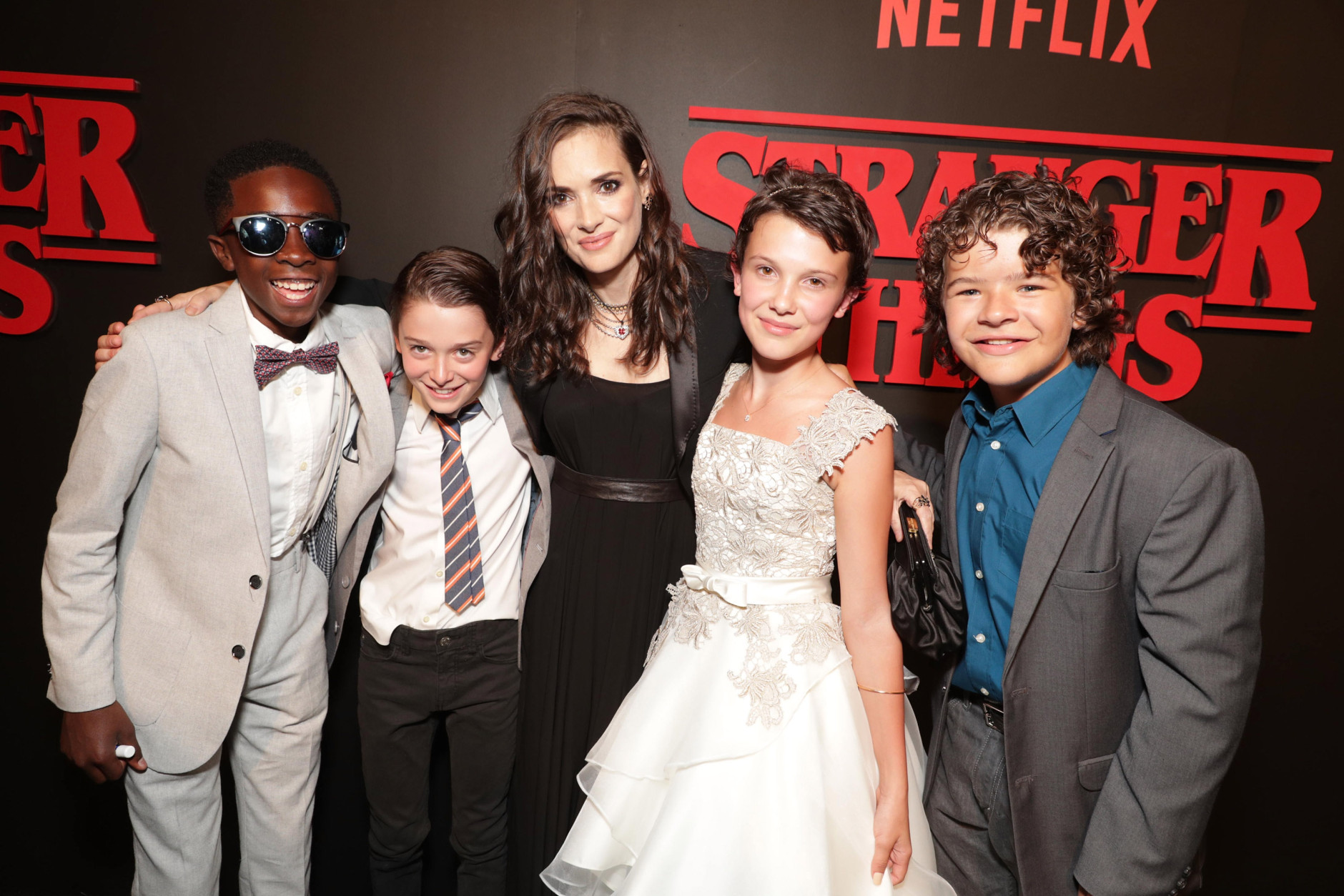 Caleb McLaughlin, Noah Schnapp, Winona Ryder, Millie Brown, Gaten Matarazzo seen at the red carpet premiere in support of the launch of the Netflix original series "Stranger Things" at Mack Sennett Studios on Monday, July 11, 2016, in Los Angeles, CA. (Photo by Eric Charbonneau/Invision for Netflix/AP Images)