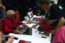 Michelle Nichols, who starred as Uhura, signs autographs at the Las Vegas Star Trek Convention on Aug. 4, 2016. (WTOP/Steve Winter)