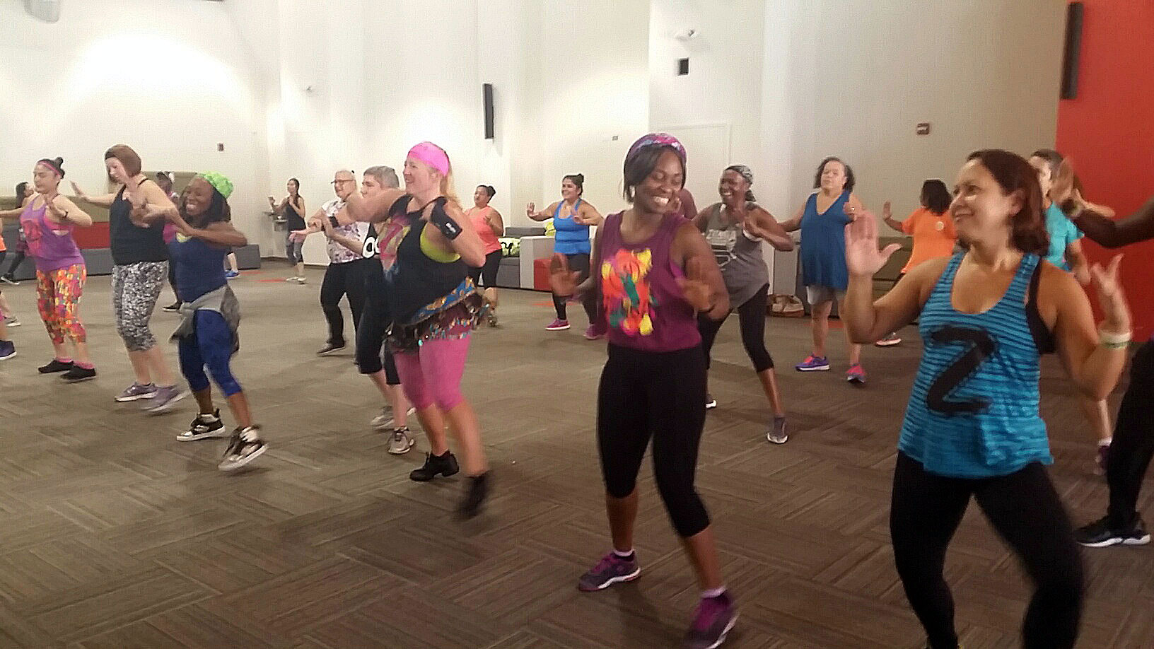 The goal of this Zumbathon event was to raise funds for victims of an explosion at Flower Branch Apartments in Silver Spring, Md. (WTOP/Kathy Stewart)