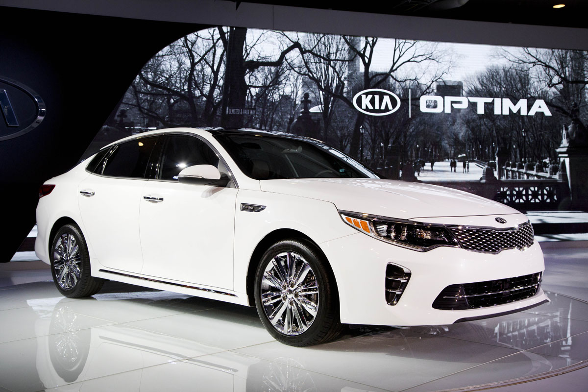 FILE - In this April 1, 2015 file photo, the 2016 Kia Optima is presented at the New York International Auto Show. Kia’s best-seller in the U.S., the Optima midsize car, gets its first full redesign since 2011. It’s longer, wider and stiffer, and has a bigger interior. (AP Photo/Mark Lennihan, File)