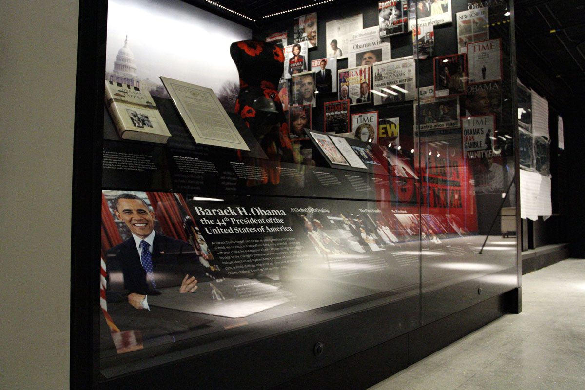 In this photo taken July 18, 2016, an exhibit depicting the presidency and the life of President Barack Obama and his family is seen during a media preview tour at the Smithsonian National Museum of African American History and Culture in Washington. The museum's grand opening will be on Sept. 24. (AP Photo/Paul Holston)