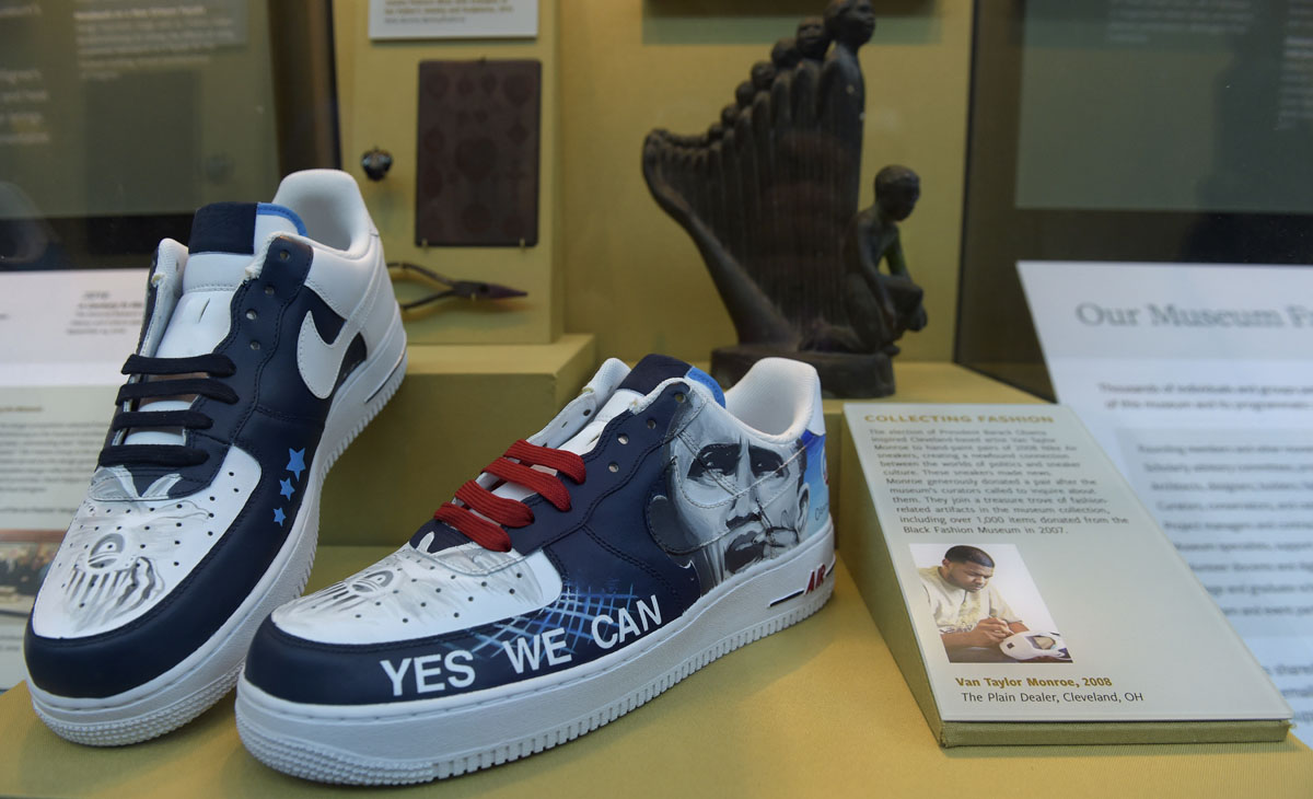 Shoes, featuring President Barack Obama, painted by Van Taylor Monroe are on display at the National Museum of African American History and Culture in Washington, Wednesday, Sept. 14, 2016. (AP Photo/Susan Walsh)