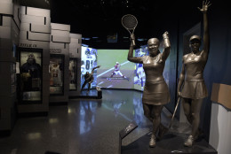 A statue of the Williams sisters, Serena and Venus, is part of the sports exhibit at the National Museum of African American History and Culture in Washington, Wednesday, Sept. 14, 2016. (AP Photo/Susan Walsh)