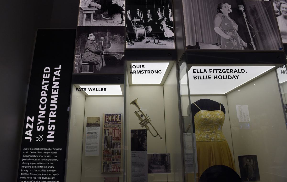 Louis Armstrong's trumpet, and other artifacts are displayed at the National Museum of African American History and Culture in Washington, Wednesday, Sept. 14, 2016, during a press preview. (AP Photo/Susan Walsh)