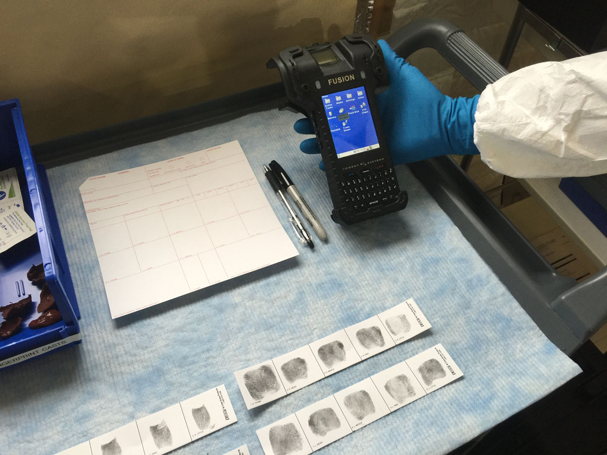 The digital scanner at top right can record a decedent's finger prints. (WTOP/Kristi King)