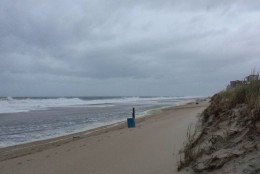 These shots were taken three hours before high tide Saturday night between 125th and 126th streets in Ocean City, Maryland. The surf is approaching the dunes. Very little beach is left. (WTOP/Colleen Kelleher)
