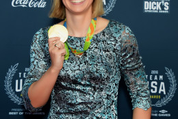 Katie Ledecky poses with one of her gold medals on the red carpet of the Team USA Awards. (Courtesy Shannon Finney, <a href="http://www.shannonfinneyphotography.com">www.shannonfinneyphotography.com</a>)