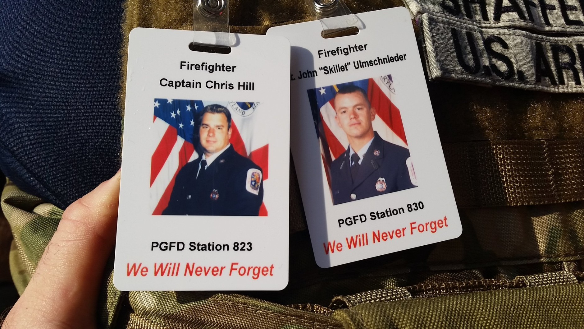 County firefighter John “Skillet” Ulmschneider was shot and killed in April while answering a call, and county firefighter Chris Hill died in August of brain cancer related to the job, said Prince George's County Fire Chief Marc Bashoor. Both firefighters were honored during the 9/11 Memorial Stair Climb event Saturday at National Harbor. (WTOP/Kathy Stewart)