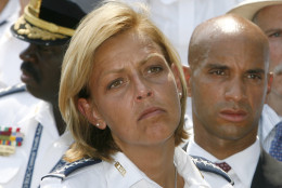 District of Columbia Chief of Police Cathy Lanier, left, and Mayor Adrian Fenty announce that the city will ask the U.S. Supreme Court to reverse a  federal appeals court panel ruling overturning a 30-year law banning handguns in private homes, at a news conference in Washington on Monday, July 16, 2007. (AP Photo/Jacquelyn Martin)