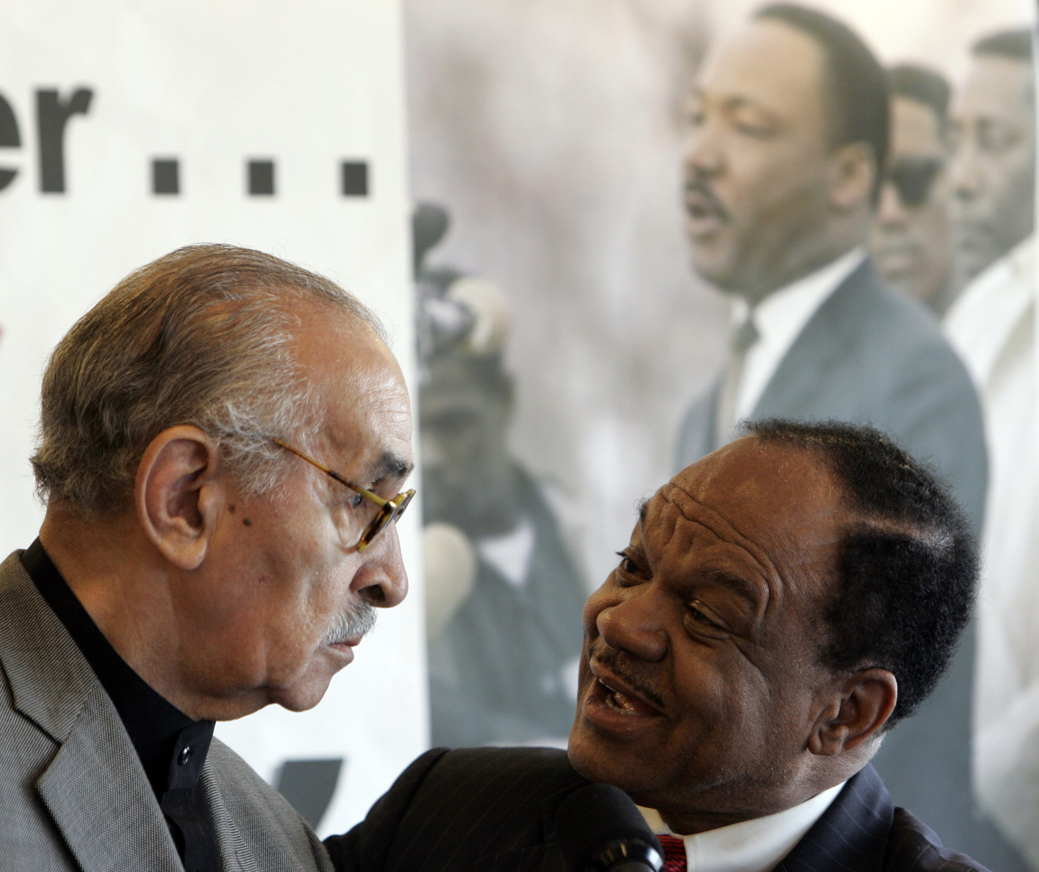 Civil rights leader Wyatt Tee Walker, left, is introduced by civil rights leader Walter Fauntroy, right, during a rally at the National Press Club in Washington, Tuesday, July 2, 2008 to present a retrospective of where the nation has come in the 45 years since Dr. Martin Luther King's "I Have a Dream" speech. (AP Photo/Susan Walsh)