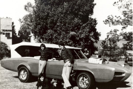 FILE - In this 1966 file photo, cast members of the television show "The Monkees," from top left, Davy Jones, Michael Nesmith, from lower left, Micky Dolenz, and Peter Tork pose next to their customized Pontiac GTO. Jones died Wednesday Feb. 29, 2012 in Florida. He was 66. Jones rose to fame in 1965 when he joined The Monkees, a British popular rock group formed for a television show. Jones sang lead vocals on songs like "I Wanna Be Free" and "Daydream Believer."    (AP Photo/File)