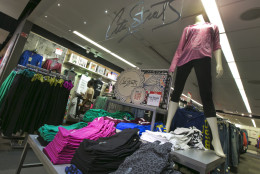 In this Tuesday, Aug. 19, 2014 photo, City Streets athleisure wear is displayed in the Juniors department at a J.C. Penney store, in New York. Sales of jeans in the U.S. fell 6 percent to $16 billion during the year that ended in June, according to research firm NPD Group, while sales of yoga pants and other active wear climbed 7 percent to $33.6 billion. (AP Photo/Richard Drew)