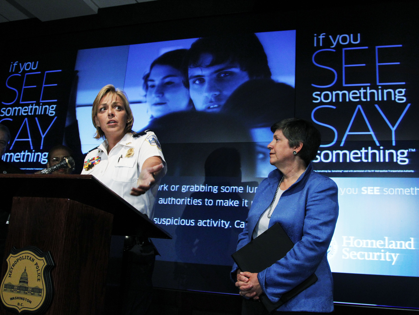 Washington Police Chief Cathy Lanier, left, accompanied by Homeland Security Secretary Janet Napolitano, speaks during a news conference on the launching of a series of community-based initiatives in conjunction with National Night Out, Tuesday, Aug. 3, 2010, in Washington.   (AP Photo/Manuel Balce Ceneta)