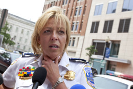 FILE - This Aug. 15, 2012 file photo shows Washington Police Chief Cathy Lanier meeting with reporters in Washington. Washington's murder rate was approaching nearly 500 slayings a year in the early 1990s, the annual rate has gradually declined to the point that the city is now on the verge of a once-unthinkable milestone. The number of 2012 killings in the District of Columbia stands at 78 and is on pace to finish lower than 100 for the first time since 1963, police records show.  (AP Photo/J. Scott Applewhite, File)