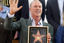 Academy Award winning actor Michael Keaton waves at a ceremony awarding him with a star on the Hollywood Walk of Fame in Los Angeles, Thursday, July 28, 2016. (AP Photo/Nick Ut)