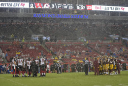 The Tampa Bay Buccaneers and Washington Redskins play each other in a driving rain storm from tropical storm Hermine during the first quarter of an NFL preseason football game Wednesday, Aug. 31, 2016, in Tampa, Fla. (AP Photo/Phelan M. Ebenhack)