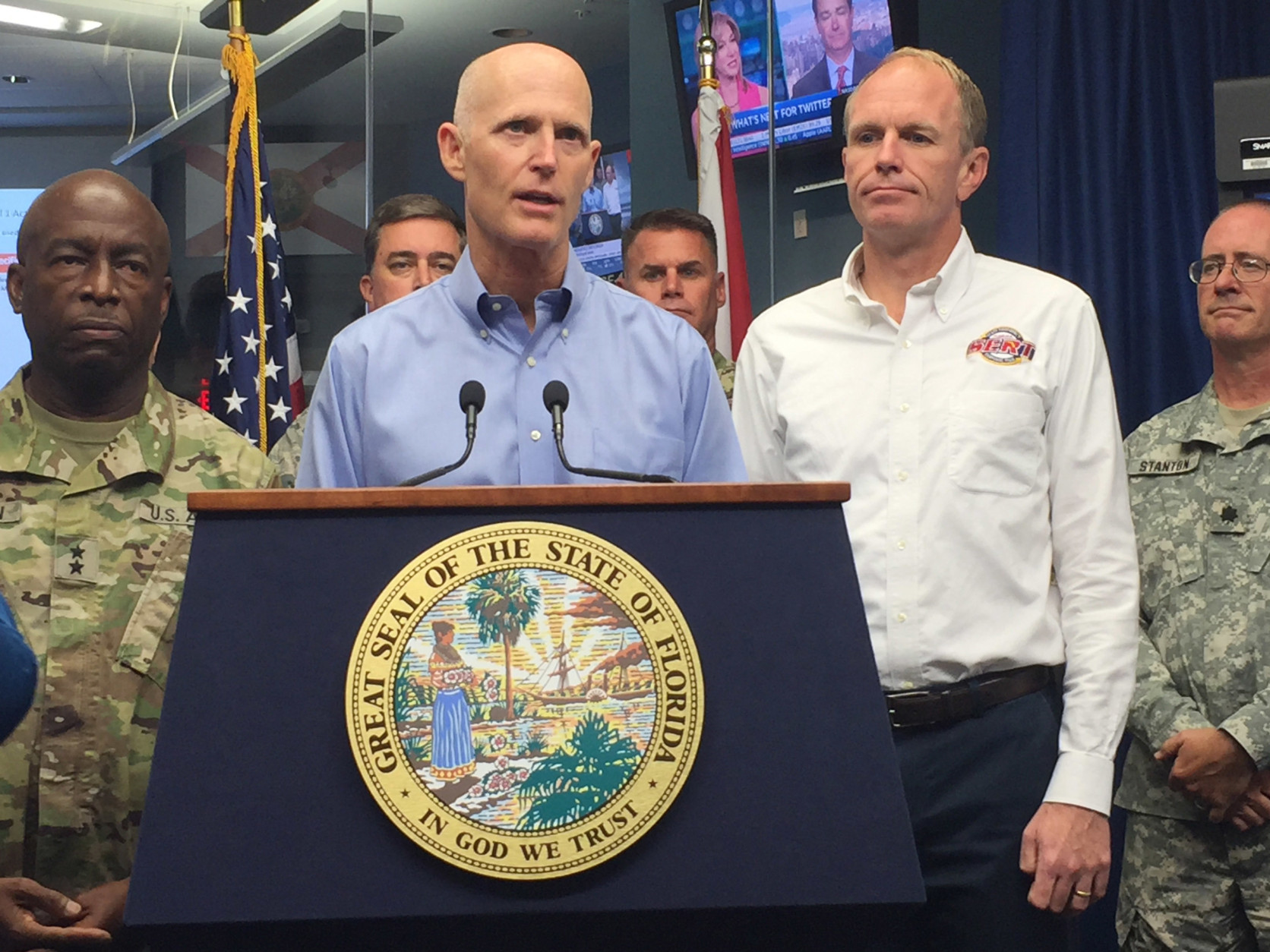 Florida Gov. Rick Scott, center, and Florida Emergency Management Director Bryan Koon, right, give an update on Tropical Storm Hermine at the State Disaster Operations Center in Tallahassee, Fla., on Thursday, Sept. 1, 2016. Scott says Tropical Storm Hermine is potentially life-threatening, and he's urging Gulf Coast residents to take precautions immediately.
(AP Photo/Joe Reedy)