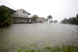 Ground water begins to flood some low lying areas as Tropical Storm Hermine heads inland Thursday, Sept. 1, 2016, in Dekle Beach, Fla. A hurricane warning was in effect for Florida's Big Bend from the Suwannee River to Mexico Beach.(AP Photo/John Raoux)